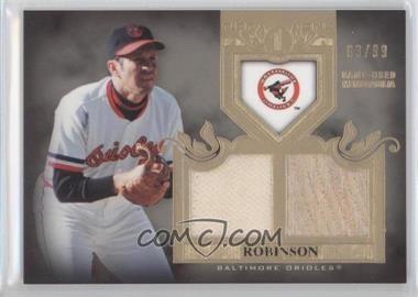 2011 Topps Tier One Top Shelf Relics Dual #TSR45 - Brooks Robinson/99 - Courtesy of COMC.com